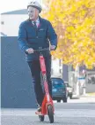  ??  ?? Premier Peter Gutwein tries out an electric scooter.