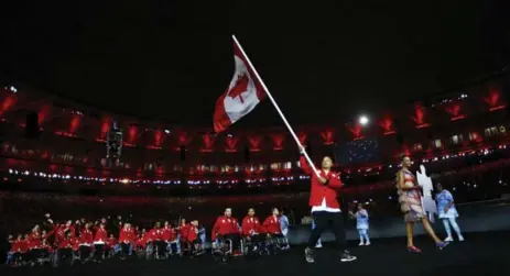  ?? RICARDO MORAES/REUTERS ?? Canadian athletes take part in the opening ceremony of the Paralympic­s in Rio on Wednesday. Canada has 162 athletes competing in 19 sports.