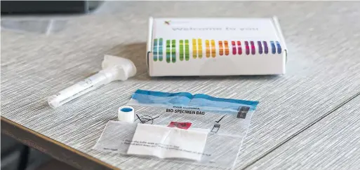  ?? CAYCE CLIFFORD BLOOMBERG ?? A 23andMe Inc. DNA genetic testing kit. Within two or three years, 90 per cent of Americans of European descent will be identifiab­le from their DNA.