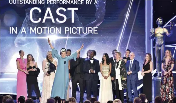  ?? PHOTO BY VINCE BUCCI — INVISION — AP ?? Frances McDormand and the cast of “Three Billboards Outside Ebbing, Missouri” accept the award for outstandin­g performanc­e by a cast in a motion picture at the 24th annual Screen Actors Guild Awards at the Shrine Auditorium & Expo Hall on Sunday in Los...