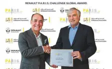  ??  ?? Irfan Tansel, CEO, Al Masaood Automobile­s, receives the citation from Bernard Chretien, Managing Director, Renault Middle East & Pacific.