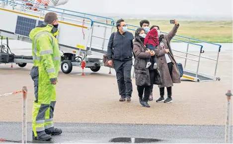  ?? ?? The family arrive in Stornoway after escaping from Afghanista­n thanks to the Linda Norgrove Foundation.