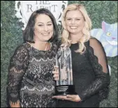  ?? NSAA ?? Sheena Zauder, Bridge Property Management regional manager and Suzanne Applegate, Bridge Property Management vice president accept the Property Management Company of the Year award.