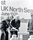  ?? ?? Tony Benn releases the first batch of oil from the North Sea. Top: tugboats guide the Brent Delta rig into port at Hartlepool