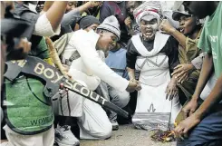  ?? Pictures: Muntu Vilakazi ?? STREET JUSTICE During the rape trial large crowds of supporters, left, cheered outside court for Jacob Zuma, who arrived ready for a fight, right.