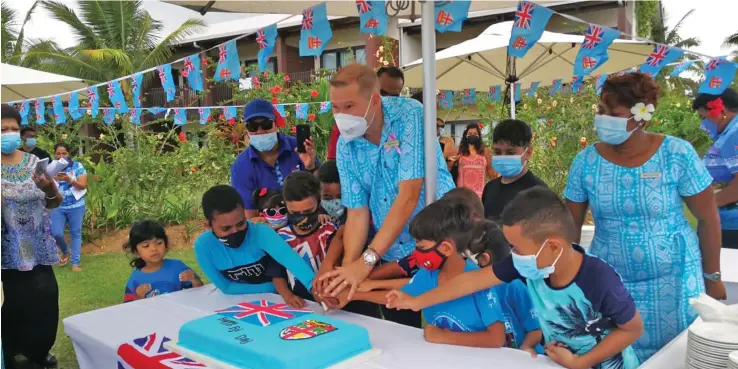  ?? ?? Fiji Marriott Resort Momi Bay general manager Silvano Dressino with younger guests.