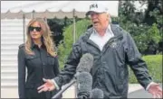  ?? AFP ?? Donald and Melania Trump speak to the press before departing Washington for hurricanea­ffected areas in Florida.