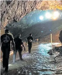  ??  ?? Social media picture of rescuers at work in the cave