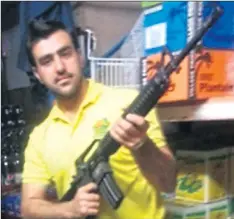  ??  ?? Hakim Nasiri with gun in a photo issued by police yesterday