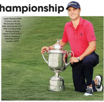  ??  ?? Justin Thomas of the US poses with the Wanamaker Trophy after winning the 2017 PGA Championsh­ip during the final round at Quail Hollow Club on Sunday in Charlotte, North Carolina. (AFP)