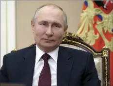  ?? SPUTNIK, KREMLIN POOL PHOTO VIA AP ?? Russian President Vladimir Putin attends a meeting on social and economic developmen­t of Crimea and Sevastopol, via video conference in Moscow, Russia, Thursday.