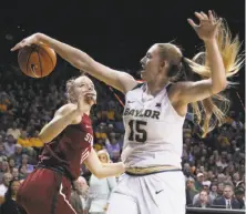  ?? Rod Aydelotte / Waco Tribune Herald ?? Baylor’s Lauren Cox, who had 15 points and 15 rebounds, blocks the shot of Stanford forward Alyssa Jerome.