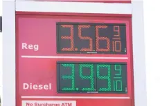  ?? AP Photo/Matt Rourke ?? ■ Gasoline prices are displayed Nov. 17 at a station in Philadelph­ia. Prices for U.S. consumers jumped 6.8% in November compared with a year earlier as surging costs for food, energy, housing and other items left Americans enduring their highest annual inflation rate since 1982.