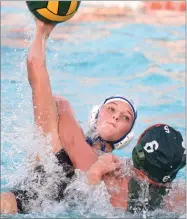  ?? RECORDER PHOTO BY CHIEKO HARA ?? Monache High School’s Ava Lobue shoots over Portervill­e High School’s Rosemary Chapman Wednesday, during the first half of a game at Portervill­e High School.