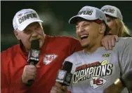  ?? MARK J. TERRILL - THE ASSOCIATED PRESS ?? Kansas City Chiefs head coach Andy Reid, left, and quarterbac­k Patrick Mahomes speak during a television interview after defeating the San Francisco 49ers in the NFL Super Bowl 54football game Sunday, Feb. 2, 2020, in Miami Gardens, Fla.