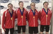  ?? ANDREW HELLER - READING EAGLE ?? Wilson’s 200free relay team of, from left, Josh Woessner, Thomas Houck, Ian Metzgar and Trentin Lechleitne­r wins gold at the District 3Class 3A championsh­ips.