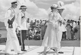  ??  ?? Wharf leaving: Leaving the Suva wharf. Sir Ronald Garvey accompanie­s the Queen, his ADC, Asst. Police Superinten­dent, Dudley Saint, accompanie­s the Duke of Edinburgh.