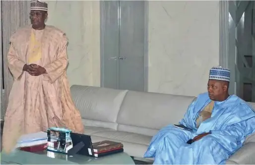  ??  ?? Indimi (left) with Borno State governor, Kashim Shettima, during the former's courtesy visit in Maiduguri