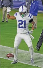  ?? AP ?? Colts running back Nyheim Hines celebrates after scoring a touchdown in the second quarter Thursday. He also added a touchdown in the third quarter.