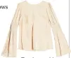  ??  ?? Topshop gold liquid satin top, £35.99