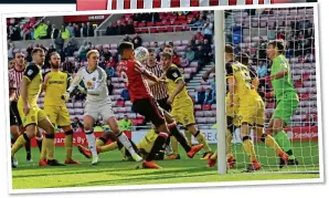  ??  ?? LATE DESPAIR: Black Cats midfielder Paddy McNair (top) has a last-gasp equaliser ruled out by referee Darren England... and Sunderland are relegated