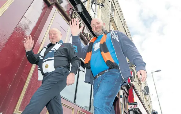  ??  ?? Paul and Richard practise the walking part of the Walk and Talk, outside the Balgay Hill Bar.