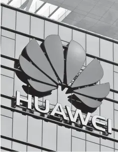  ??  ?? The Huawei logo is pictured outside Huawei’s factory campus in Dongguan, Guangdong province, China. — Reuters photo