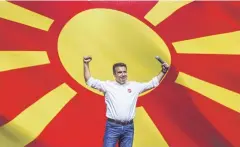  ?? AFP ?? Zoran Zaev, leader of the ruling SDSM party, gestures as he greets supporters during an election campaign rally in Skopje last week.