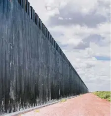  ?? Brandon Bell/Getty Images ?? A section border wall remains unfinished in La Joya after the Biden administra­tion halted constructi­on.