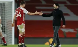  ??  ?? Mikel Arteta congratula­tes Granit Xhaka after Arsenal’s 3-1 win over Chelsea on Boxing Day. Photograph: Tom Jenkins/NMC Pool/The Guardian