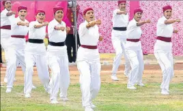  ?? BHARAT BHUSHAN /HT ?? Newly recruited in Punjab Police, woman cops showing their martial skills during the passingout parade at the commando training centre in Qila Bahadurgar­h near Patiala on Thursday.