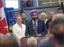  ?? GARY YOKOYAMA, THE HAMILTON SPECTATOR ?? At Canmet Materials research centre, Navdeep Bains announced $1.26 billion for innovative investment­s.