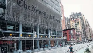  ?? JOHANNES EISELE AFP VIA GETTY IMAGES FILE PHOTO ?? New York Times added 393,000 net new digital subscripti­ons in the third quarter, down sharply from a gain of 669,000 net new digital subscripti­ons in the previous quarter.