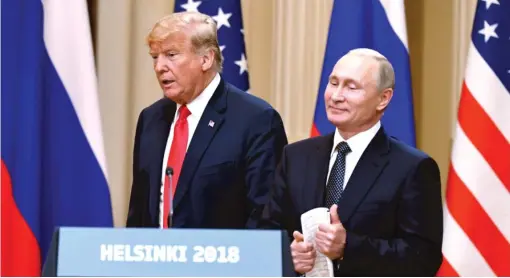  ?? JUSSI NUKARI/ LEHTIKUVA VIA AP ?? President Donald Trump and Russian President Vladimir Putin address the news media Monday in Helsinki, Finland.