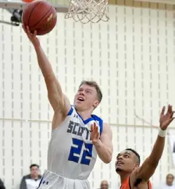  ??  ?? Union’s Seth Pinkerton lays the ball up against Clairton in the Scotties’ win Friday night at Hampton.