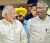  ??  ?? Prime Minister Narendra Modi with Congress’ Mallikarju­n Kharge ahead of the monsoon session of Parliament in New Delhi on Tuesday. — PTI