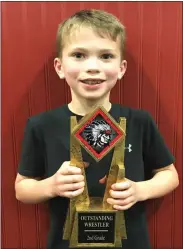  ?? Courtesy photo ?? Pictured with the Outstandin­g Wrestler Award for 2nd grade is Miles Babcock.