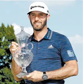  ?? FOTO: AFP ?? El trofeo del St. Jude terminó en manos de Dustin Johnson