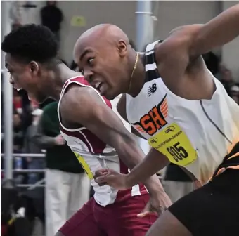  ?? CHRIS CHRISTO PHOTOS / HERALD STAFF ?? PHOTO FINISH: Lowell’s Richmond Kwaateng, left, edges South Hadley’s Jonas Clarke in the 55-meter dash at the All-State Championsh­ips on Saturday.