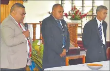  ?? ?? Eroni Qatia, Viliame Tucake and Biu Vatuvei open the Father’s Day service with prayers.