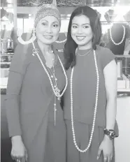  ??  ?? KC Mahadali said collecting bags, shoes and jewelries is her bonding activity with her mom. (Jo Ann Sablad)