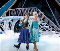  ??  ?? Anna ( Taylor Firth) and Elsa ( Becky Bereswill) take to the ice.