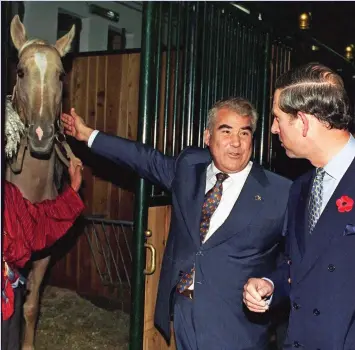  ??  ?? stalling: Charles plays it clever as President Niyazov shows him his prize horses