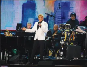  ?? Andy Kropa
The Associated Press ?? Barry Manilow performs at We Love NYC: The Homecoming Concert at The Great Lawn in Central Park on Aug. 21, 2021, in New York.