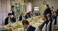  ?? MATTHEW LEE, POOL - THE ASSOCIATED PRESS ?? Secretary of State Mike Pompeo, right, stands as he speaks during a dinner between North Korean dignitarie­s and US diplomats, Pyonyang, North Korea on Wednesday, May 9, 2018.