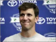  ?? JULIO CORTEZ — THE ASSOCIATED PRESS ?? Giants quarterbac­k Eli Manning talks to reporters Friday in East Rutherford, N.J.