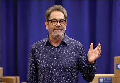  ?? JAMIE MCCARTHY — GETTY IMAGES ?? Huey Lewis is behind “The Heart of Rock and Roll.”