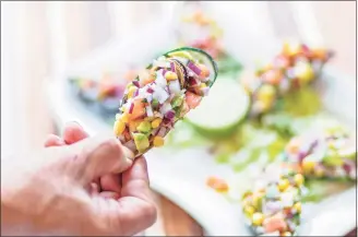  ?? Joseph Antony / Contribute­d photo ?? Choritos a la chalaca (steamed mussels covered with chopped onions, corn, avocado, cilantro and lime juice) at Empire of the Incas in Danbury.