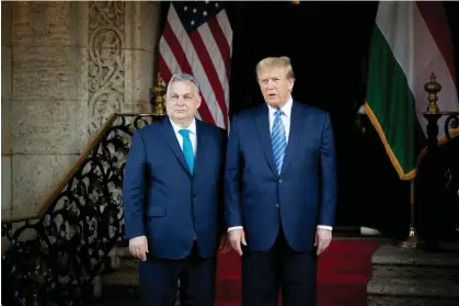  ?? Zoltán Fischer/EPA ?? Viktor Orbán and Donald Trump before their meeting at Trump's Mar-a-Lago estate in Palm Beach, Florida, on 8 March. Photograph: