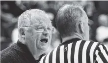  ?? STAFF FILE PHOTO BY DOUG STRICKLAND ?? UTC women’s basketball coach Jim Foster has words with an official during a home game in 2017. Foster hopes the Mocs “learn to respect” the basketball this season.